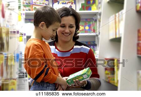 Shopping for educational books and games View Large Photo Image Stock Photography - Shopping for educational books and games. Fotosearch