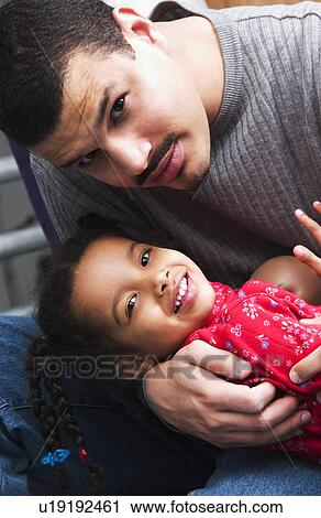 Stock Image - Father and daughter. Fotosearch