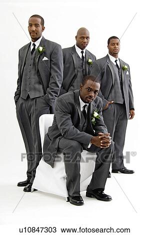 Stock Image - Groom with wedding party. Fotosearch