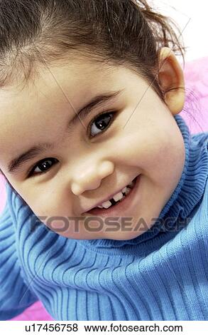 Little girl smiling View Large Photo Image Stock Photo - Little girl smiling. Fotosearch