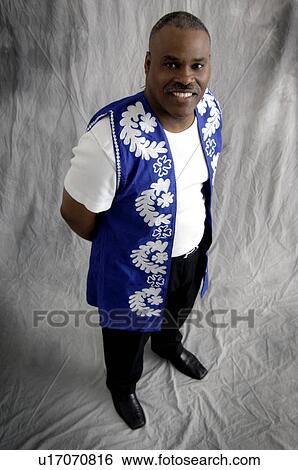 Stock Photograph - Man dressed for Kwanzaa. Fotosearch