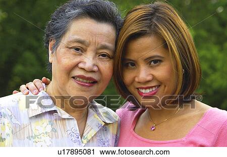 Stock Image - Two Asian women. Fotosearch