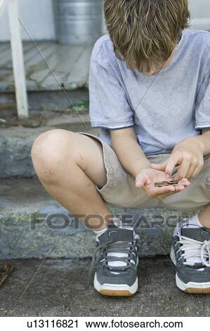 Boy counting money View Large Photo Image Stock Image - Boy counting money. Fotosearch