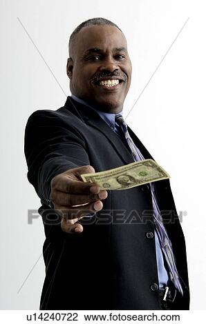 Businessman holding money View Large Photo Image Stock Image - Businessman holding money. Fotosearch