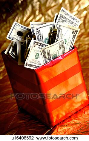 Money in gift box View Large Photo Image Stock Image - Money in gift box. Fotosearch