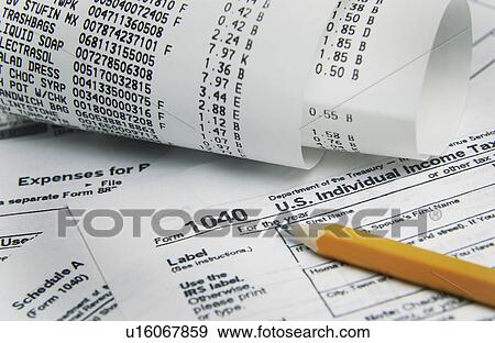 Stock Photo - Tax paperwork. Fotosearch