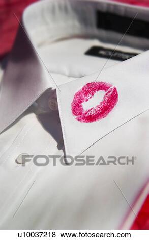 Lipstick on shirt collar View Large Photo Image Stock Photo - Lipstick on shirt collar. Fotosearch