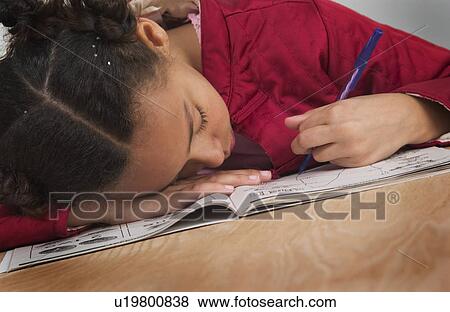 African American girl falling asleep doing homework View Large Photo Image Stock Photo - African American girl falling asleep doing homework. Fotosearch
