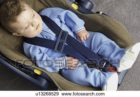 Infant in car seat View Large Photo Image Stock Photo - Infant in car seat. Fotosearch