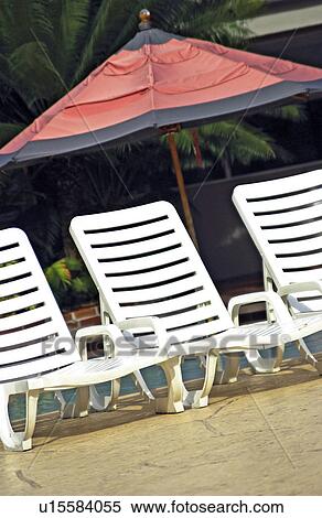 Lounge chairs on beach View Large Photo Image Stock Photography - Lounge chairs on beach. Fotosearch