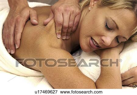 Stock Photo - Woman getting massage. Fotosearch
