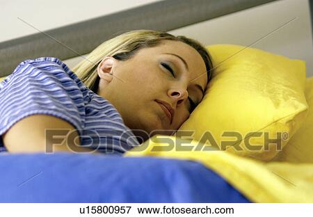 Stock Photo - Woman sleeping. Fotosearch
