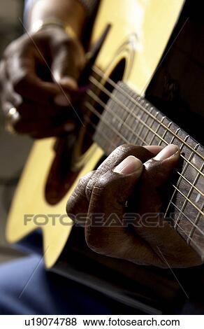 African American man playing guitar View Large Photo Image Stock Photo - African American man playing guitar. Fotosearch