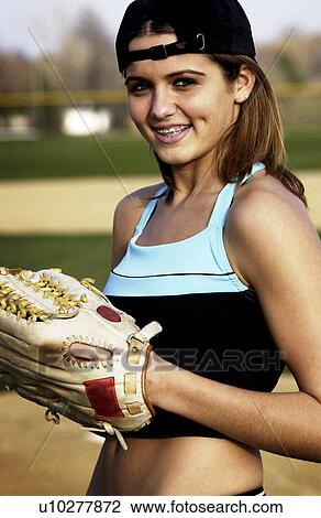 Girl playing softball View Large Photo Image Stock Image - Girl playing softball. Fotosearch
