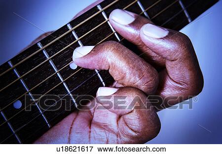 Man playing guitar View Large Photo Image Stock Photo - Man playing guitar. Fotosearch