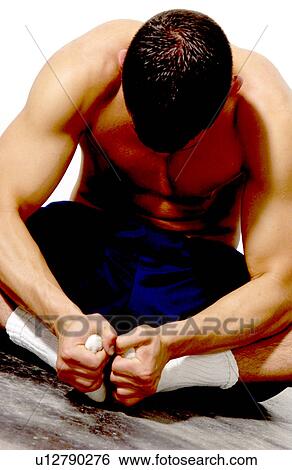 Stock Photograph - Man stretching. Fotosearch
