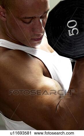 Stock Image - Man working out. Fotosearch