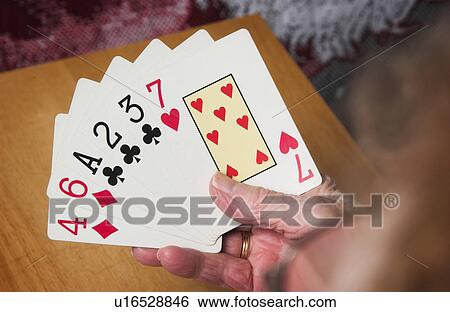 Senior woman playing cards View Large Photo Image Stock Photograph - Senior woman playing cards. Fotosearch