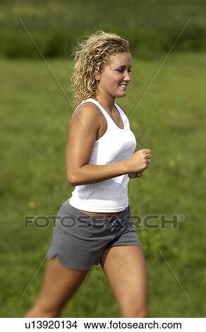 Picture - Woman running. Fotosearch