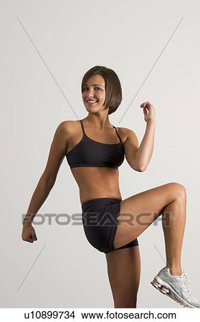 Woman exercising View Large Photo Image Picture - Woman exercising. Fotosearch