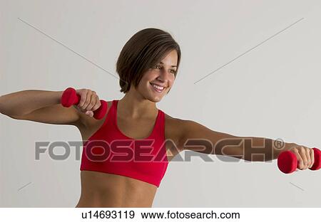 Stock Photo - Woman exercising. Fotosearch