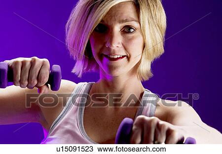 Woman with weights View Large Photo Image Stock Image - Woman with weights . Fotosearch