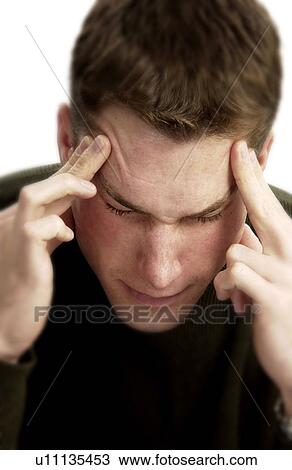 Stock Image - Man with headache. Fotosearch