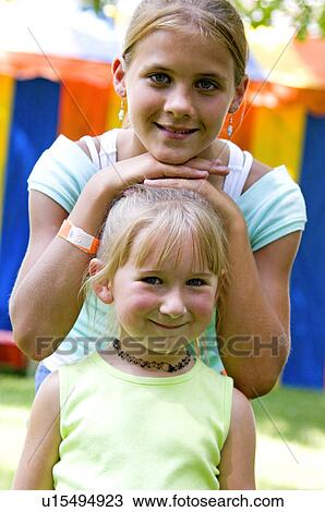 Girls at carnival View Large Photo Image Stock Image - Girls at carnival. Fotosearch
