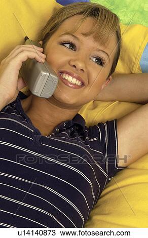 Teenage girl on phone View Large Photo Image Stock Image - Teenage girl on phone. Fotosearch