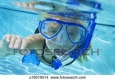 Picture - Child snorkeling in pool. Fotosearch