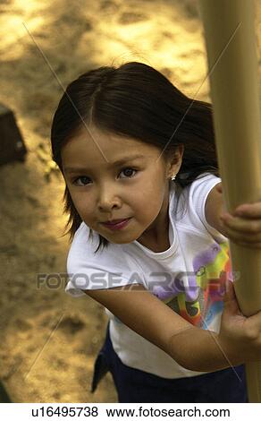 Stock Photo - Girl on playground. Fotosearch