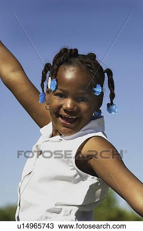 Girl playing outside View Large Photo Image Stock Image - Girl playing outside. Fotosearch