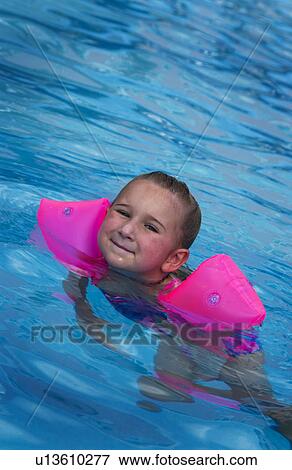 Girl swimming View Large Photo Image Stock Photo - Girl swimming. Fotosearch