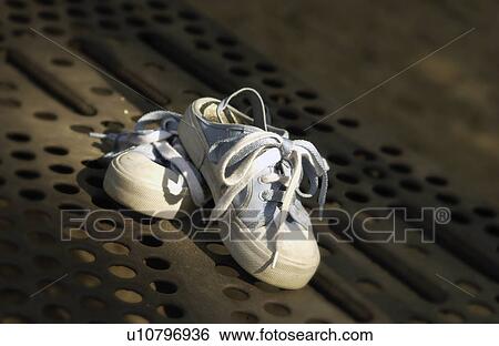 Stock Photograph - Kids tennis shoes. Fotosearch