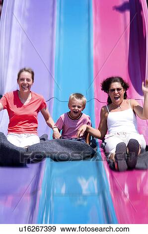People on carnival ride View Large Photo Image Stock Photo - People on carnival ride. Fotosearch