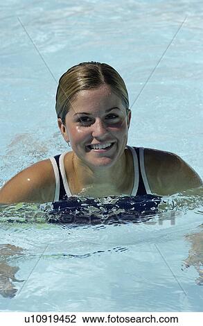 Woman in swimming pool View Large Photo Image Stock Image - Woman in swimming pool. Fotosearch