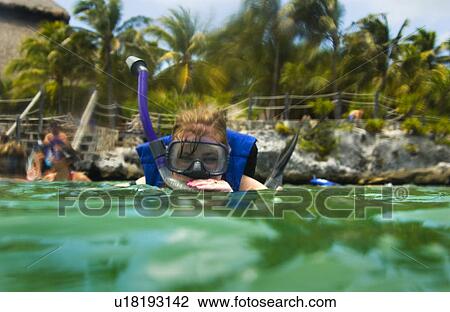 Woman snorkeling View Large Photo Image Stock Image - Woman snorkeling. Fotosearch