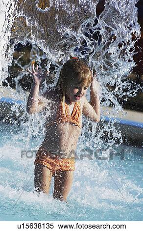 Stock Photography - Young girl in pool. Fotosearch