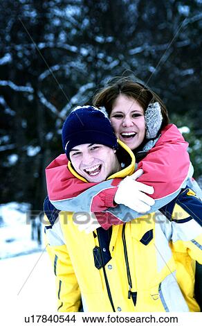 Picture - Couple in snow. Fotosearch