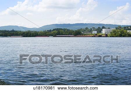 River barges parked along shore View Large Photo Image Stock Image - River barges parked along shore. Fotosearch