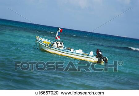 Stock Image - Boat on the ocean. Fotosearch