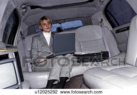 Businesswoman in limousine View Large Photo Image Stock Image - Businesswoman in limousine. Fotosearch