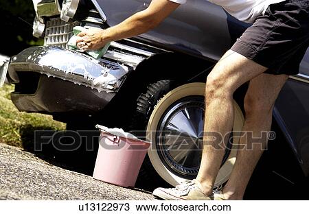 Man washing antique car View Large Photo Image Stock Image - Man washing antique car. Fotosearch