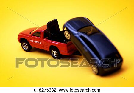 Stock Image - Model tow truck and car Model tow truck and car . Fotosearch