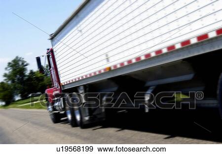Semi on road View Large Photo Image Stock Photo - Semi on road. Fotosearch