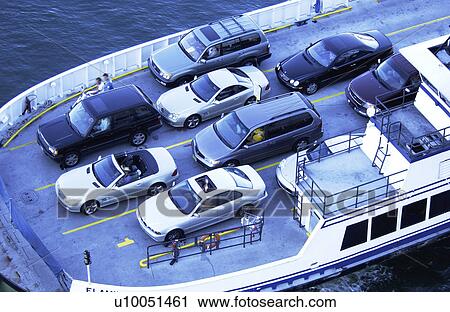Stock Image - Vehicles on ferry. Fotosearch