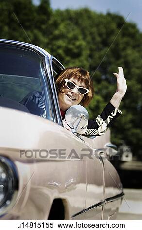 Woman in retro car View Large Photo Image Stock Photography - Woman in retro car. Fotosearch