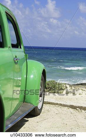 Stock Photograph - Car at the beach. Fotosearch