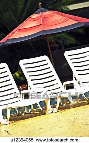 Lounge chairs on beach View Large Photo Image Stock Photography - Lounge chairs on beach. Fotosearch