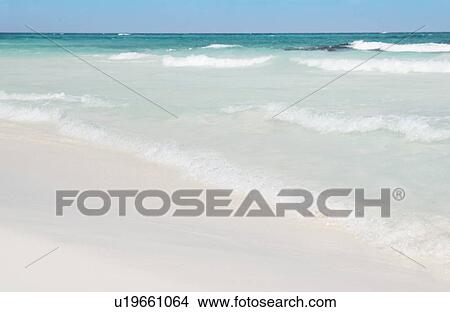 Picture - Ocean waves coming ashore. Fotosearch